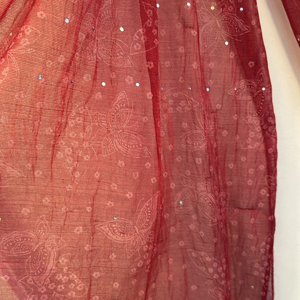 Red scarf with butterflies and sparkle.